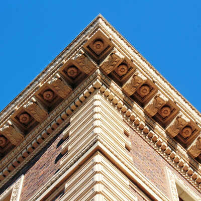 The UCBC Terracotta Restoration Project, No. 13. Post-restoration: New terracotta rosettes and cornice brackets