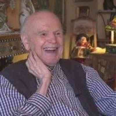 Ernest Marza, artist in his Victoria apartment, n.d.: Photographer unknown
