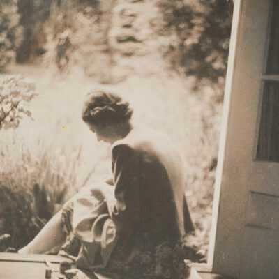 Vera Mending in the Doorway