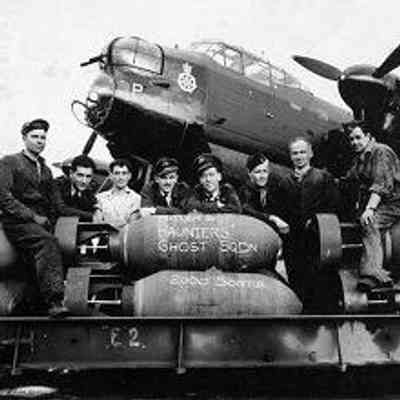 Aircrew and groundcrew of No. 428 (Ghost) Squadron, RCAF, with Avro Lancaster B.X aircraft KB760 NA:P "P-Peter"...flew the squadron’s 2,000th sortie, raid on Bremen, Germany August 18, 1944. Photographer unknown: From Library and Archives Canada, Department of National Defence Collection (e005176190)