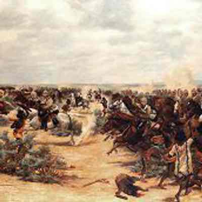 Charge at El Teb, Sudan, 1884. Oil painting by Major Godfrey Douglas Giles (1857–1941): From Horsepower: The Museum of the King’s Royal Hussars