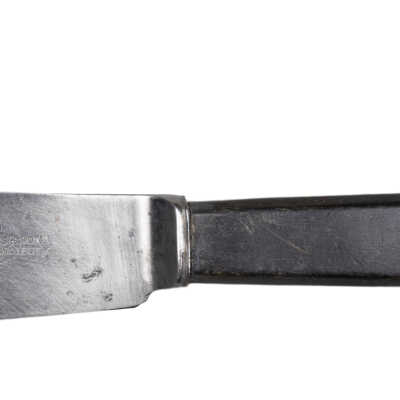Knife, combined with fork, and leather sheath for a one handed man