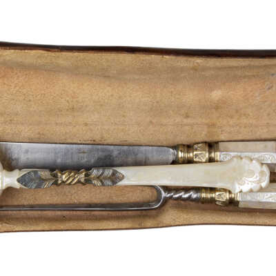 Knife fork and spoon in case.