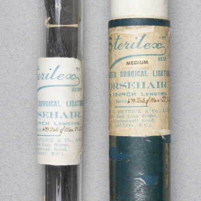 Surgical sutures in glass tube