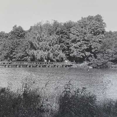 East Bay Camp, Lake Bloomington. Foot bridge between the cabins and the dining hall 1952.
