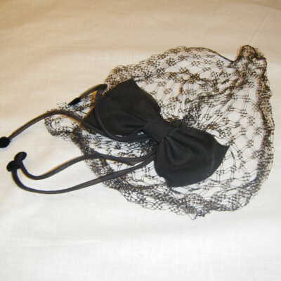 Veil hat with large bow and dangles
