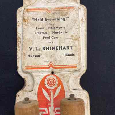 Broom Holder - V. L. Rhinehart Farm Implements & Hardware Advertising