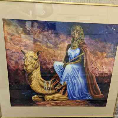 Woman on sitting camel