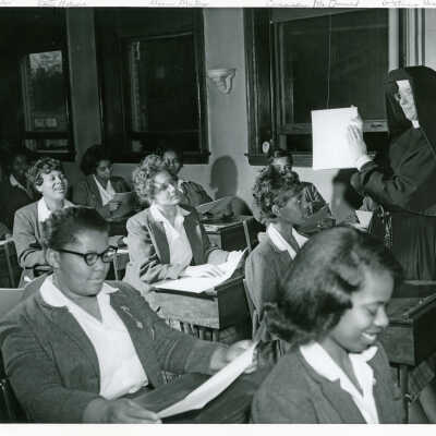 Sister Patricia Hewitt with Students