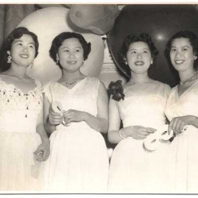 Chris Louey-Gung, Ruby Chun Tie, Anna Louey, and unidentified woman at Young Chinese League Dragon-Roo Ball, PHOTOGRAPHIC PRINT, BLACK AND WHITE PHOTOGRAPH, c.1.12.1955
