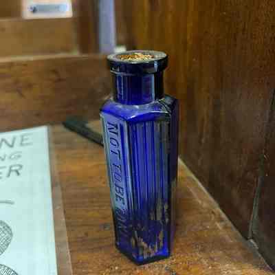 Small blue bottle