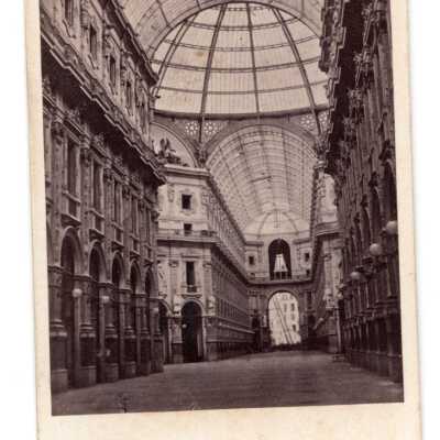 Photogrpah of Galleria Vittoria Emmanuele II: An image of Italy's oldest shopping mall, completed in 1877 and located in Milan, Italy. 