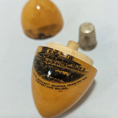 Wooden Souvenir Egg Open: Thimble and Thread inside
