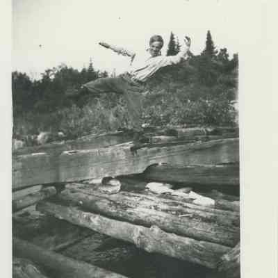 Fred Seiberling balancing on a wooden beam