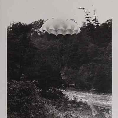 Parachute weighted with sandbags