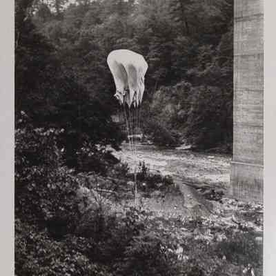 Parachute weighted with sandbags