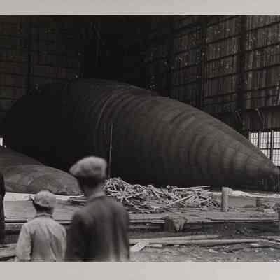 Close-up view of an inflated dirigible inside Wingfoot hangar.