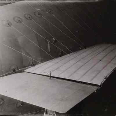 Side of tethered dirigible inside Wingfoot Lake hangar