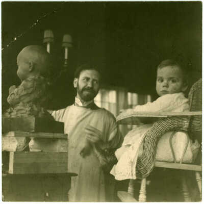 Willard D. Paddock working on the bust of John F. Seiberling, Jr.