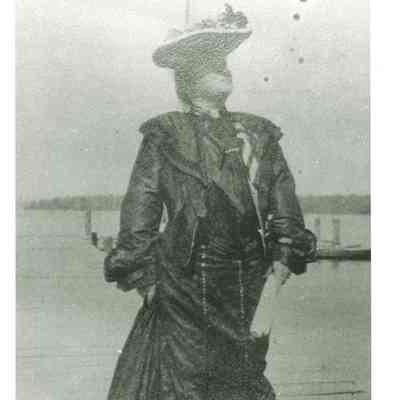 Gertrude Seiberling on the dock at Cedar Lodge