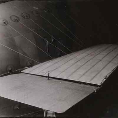 Side of tethered dirigible inside Wingfoot Lake hangar