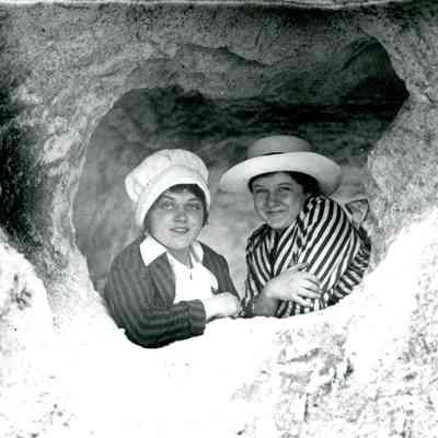 Irene Seiberling Harrison and Virginia Seiberling Handy in a cave