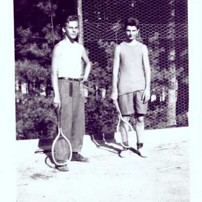 Two men on tennis court