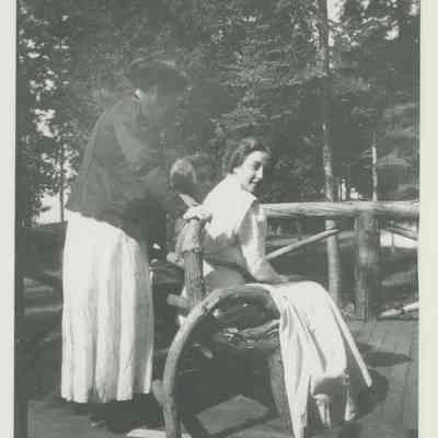 Irene and friends on the porch of the Main Cabin at Cedar Lodge