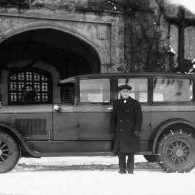 Chauffeur and car at the front door
