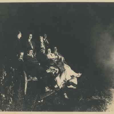 Group of young people at a campfire