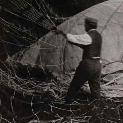 Man pulling balloon lines