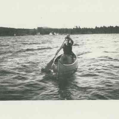 Young man canoeing