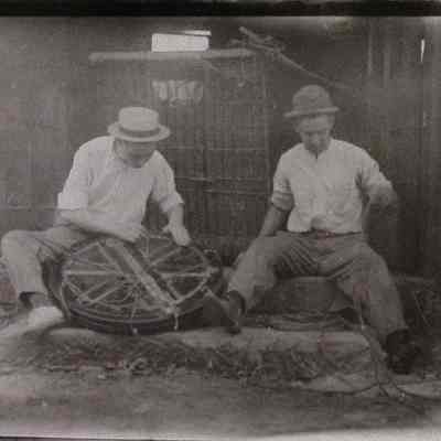 Two men working with balloon lines