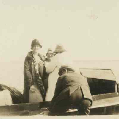 Group of people boarding a boat