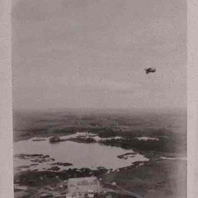 Aerial view of Goodyear Airdock at Wingfoot Lake with balloon