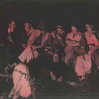 Group of young people at a campfire