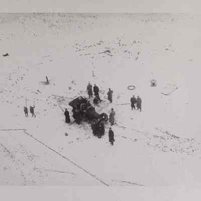 Aerial view of men and automobile at Wingfoot Lake
