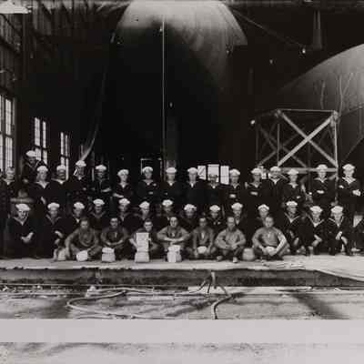 Group Photo, Navy Servicemen with Dirigibles in Hangar