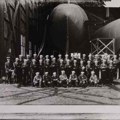 Group Photo, Navy Servicemen with Dirigibles in Hangar