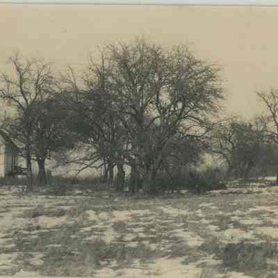 Barn in a Snow Covered Field