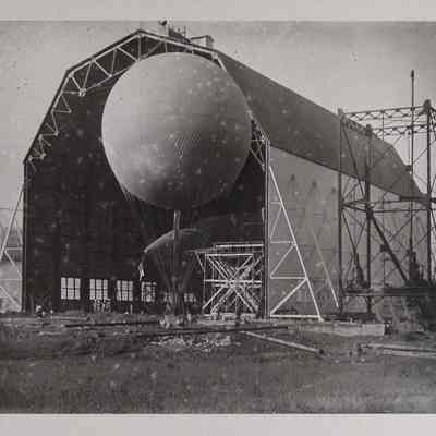 Weather balloon on ground in front of Wingfoot hangar