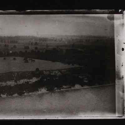 Aerial view of field and trees from balloon