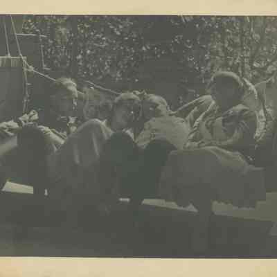 Four young people on a swing