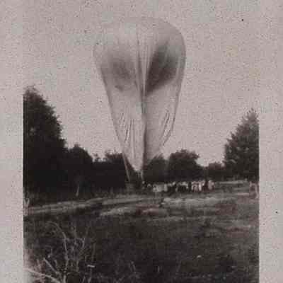 Group around a large balloon with basket