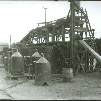 Tanks around a wooden structure