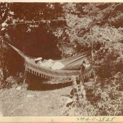 F.A.Seiberling taking a nap in hammock