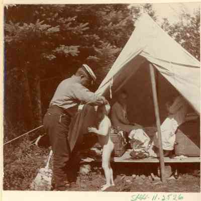 F.A. Seiberling with children at camp site