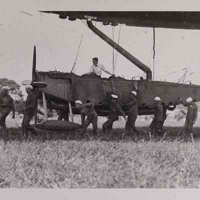 Men moving a gondola