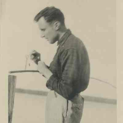 Man baiting a fishing hook