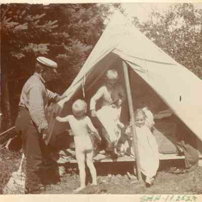 F.A. Seiberling with children at camp site